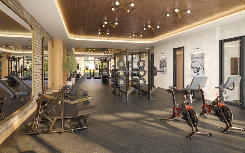 a gym with exercise equipment and mirrors