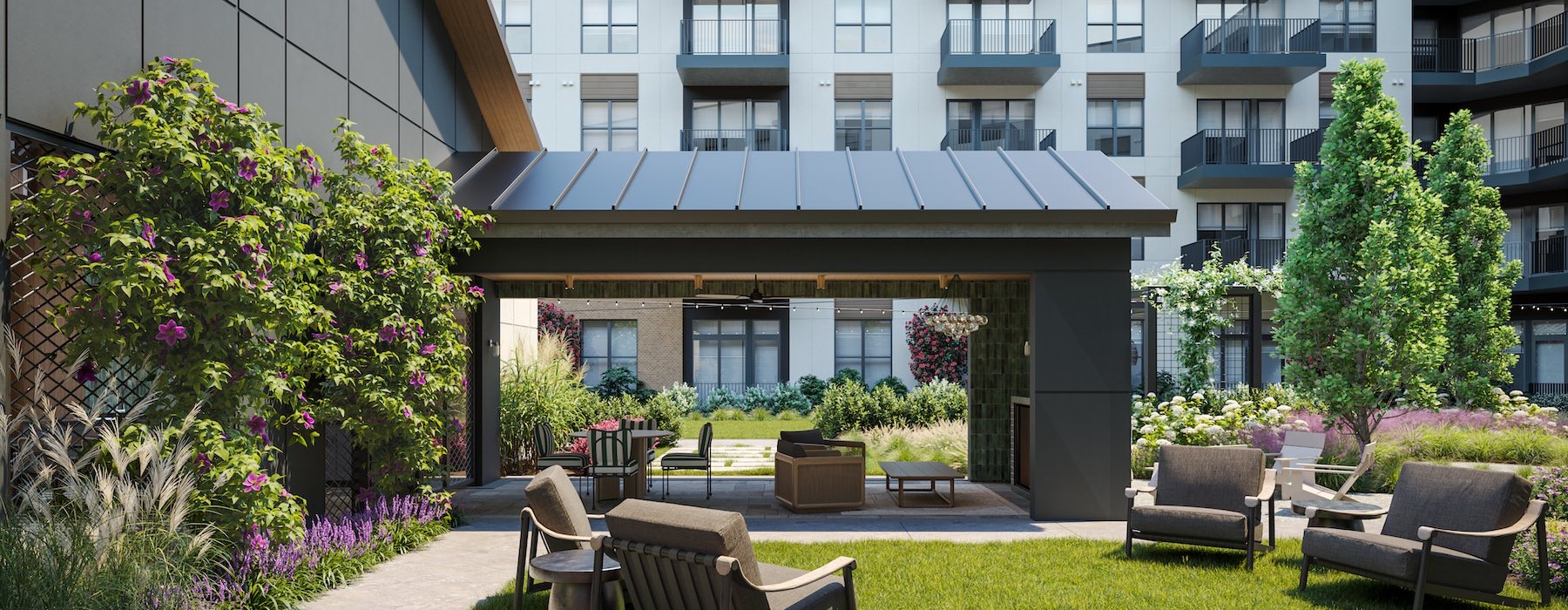 outdoor seating area with a covered patio and large building behind it